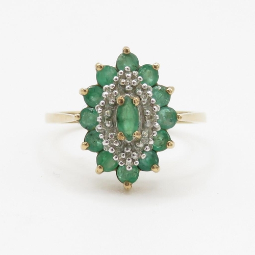 27 - 9ct gold emerald and diamond set marquise shaped ring (2.4g) Size O