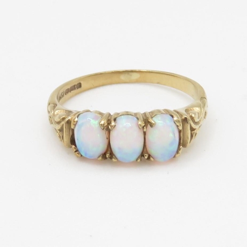 3 - 9ct gold synthetic opal three stone ring with patterned shoulders (2.2g) Size L 1/2