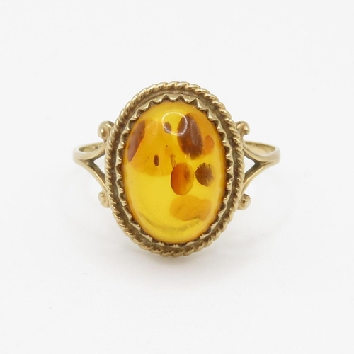 47 - 9ct gold baltic amber cabochon set cocktail ring (2g) Size T