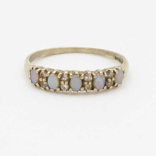 55 - 9ct gold opal and diamond set half hoop eternity ring (1.2g) Size N