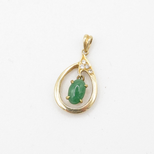 83 - 14ct gold cabochon cut jade & diamond pendant (1.7g)