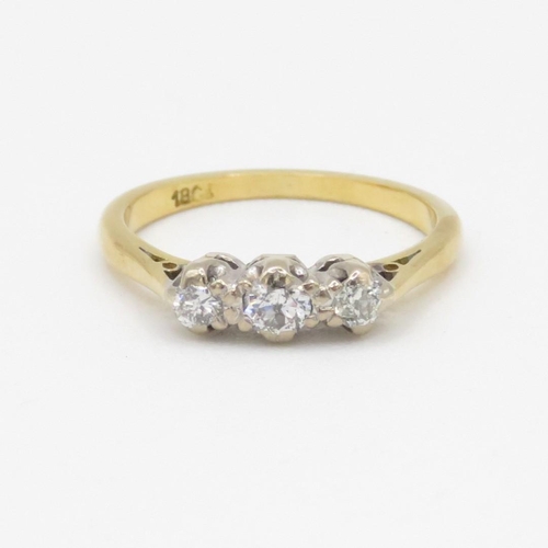 98 - 18ct gold diamond three stone ring (2.5g) Size K