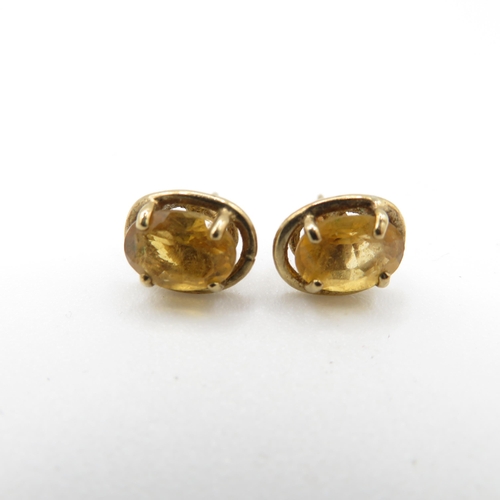 59 - 9ct gold citrine oval cut stud earrings (1.6g)