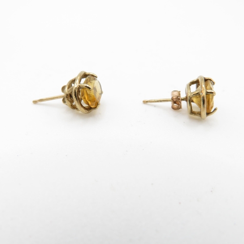 59 - 9ct gold citrine oval cut stud earrings (1.6g)