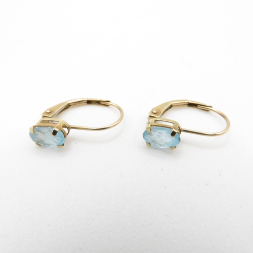 60 - 9ct gold oval cut blue topaz drop earrings (0.7g)