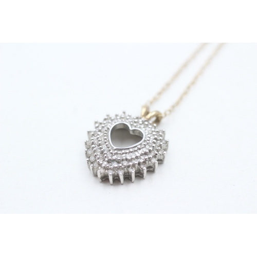 123 - 9ct gold diamond set open heart necklace (3.5g)