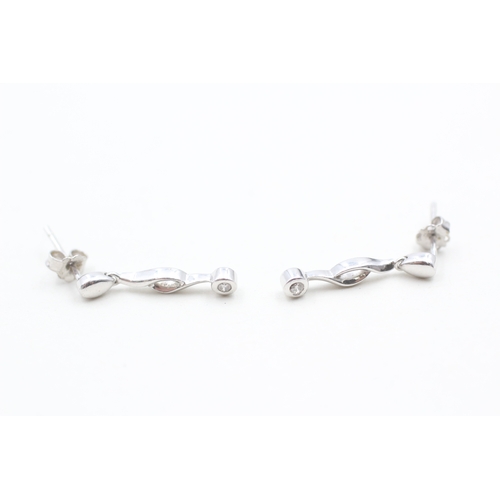 128 - 9ct white gold diamond set drop earrings (1.6g)