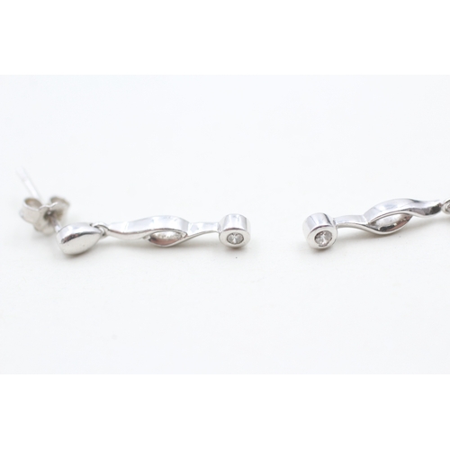 128 - 9ct white gold diamond set drop earrings (1.6g)