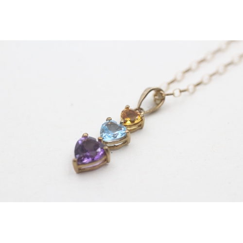 131 - 9ct gold heart cut citrine, topaz and amethyst trilogy pendant necklace (1.5g)