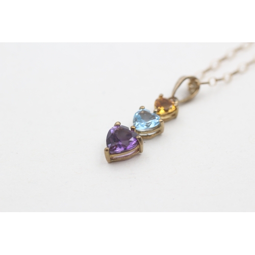 131 - 9ct gold heart cut citrine, topaz and amethyst trilogy pendant necklace (1.5g)