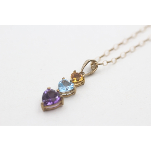 131 - 9ct gold heart cut citrine, topaz and amethyst trilogy pendant necklace (1.5g)