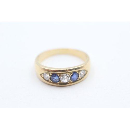 148 - 18ct gold diamond & sapphire five stone ring (5.1g) Size O