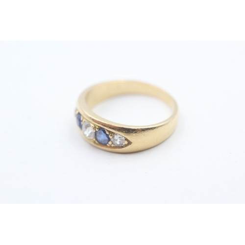 148 - 18ct gold diamond & sapphire five stone ring (5.1g) Size O