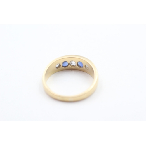 148 - 18ct gold diamond & sapphire five stone ring (5.1g) Size O