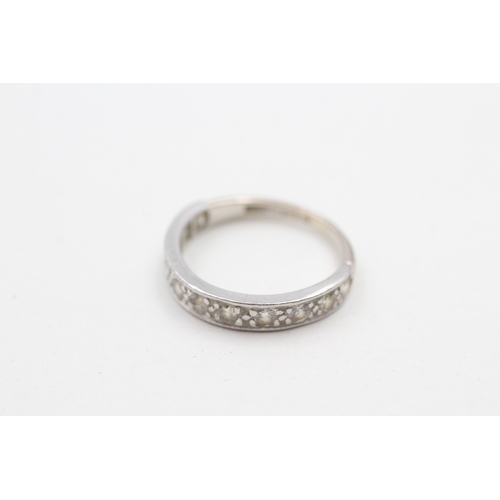 152 - 18ct white gold diamond single row band ring (3g) Size K