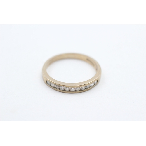 16 - 9ct gold and diamond channel set ring (1.9g) Size N 1/2