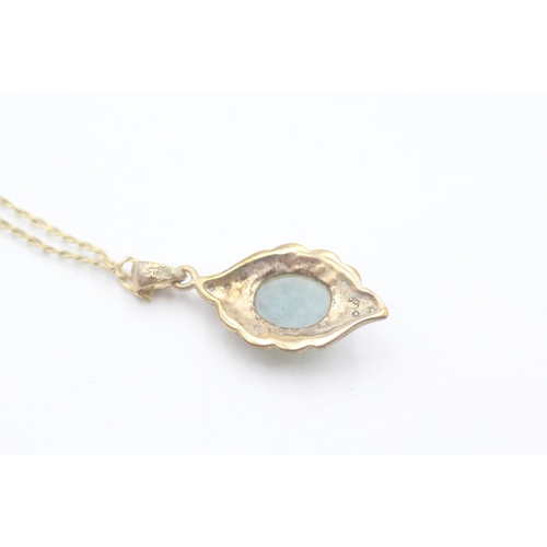 160 - 9ct gold jade and diamond pendant on chain (3.3g)