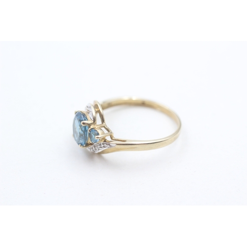 178 - 9ct gold blue topaz and diamond ring (2g) Size O