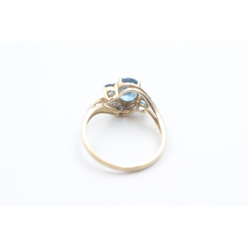 178 - 9ct gold blue topaz and diamond ring (2g) Size O