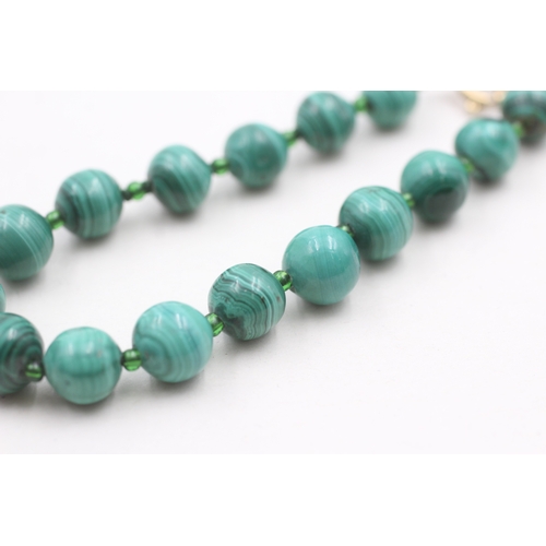 18 - 9ct gold malachite bracelet (20.2g)