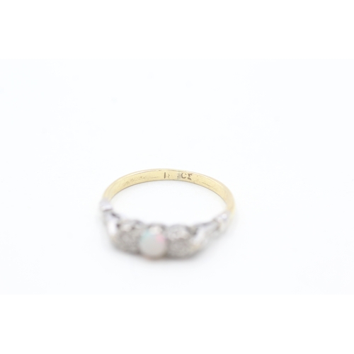 207 - 18ct gold opal and diamond ring (2.4g) Size L