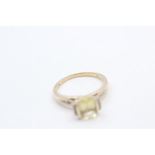 211 - 9ct gold heliodor and diamond ring (2.1g) Size N