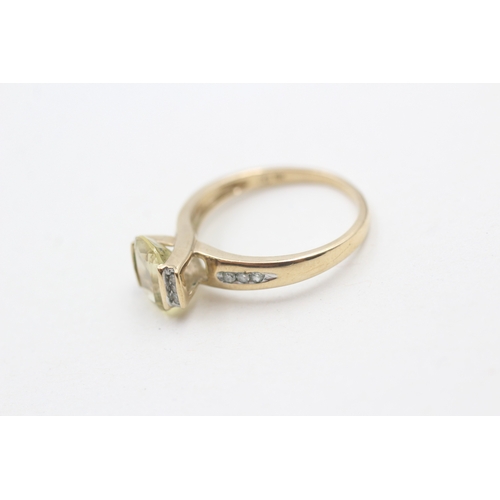 211 - 9ct gold heliodor and diamond ring (2.1g) Size N