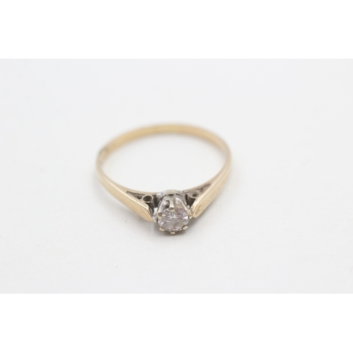 216 - 9ct gold solitaire diamond ring (1.3g) Size L