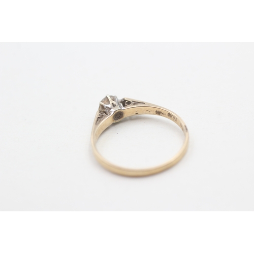 216 - 9ct gold solitaire diamond ring (1.3g) Size L