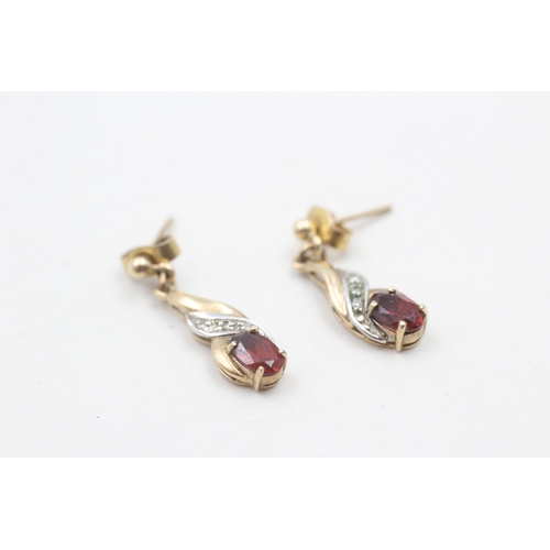 217 - 9ct gold garnet and diamond drop stud earrings (2g)