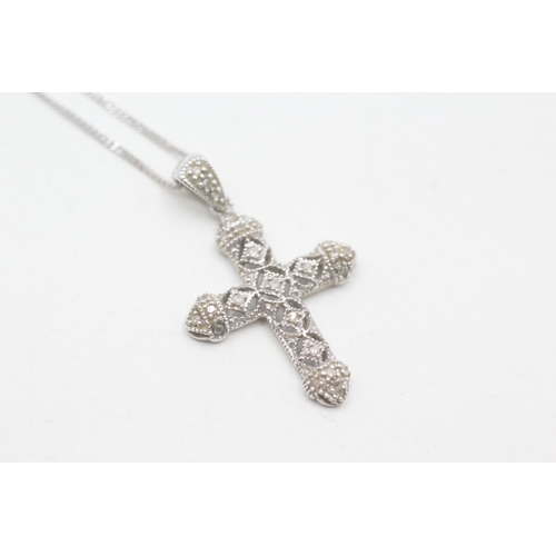 230 - 9ct gold and diamond cross pendant on chain (2.3g)