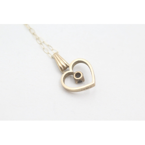 232 - 9ct gold and sapphire heart shape pendant on chain (1.3g)