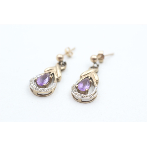 238 - 9ct gold diamond accented pear cut amethyst set drop earrings (2.6g)