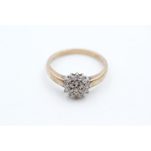 241 - 9ct gold diamond set cluster ring (2.7g) Size R