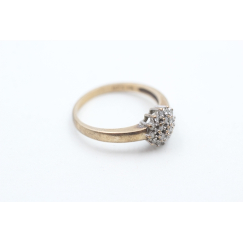 241 - 9ct gold diamond set cluster ring (2.7g) Size R