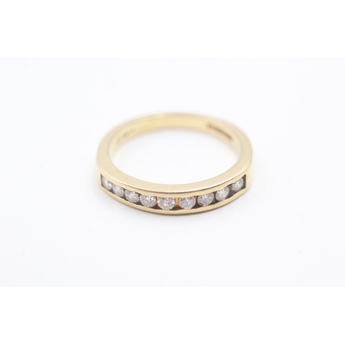 242 - 18ct gold diamond half eternity ring (4.3g) Size O 1/2