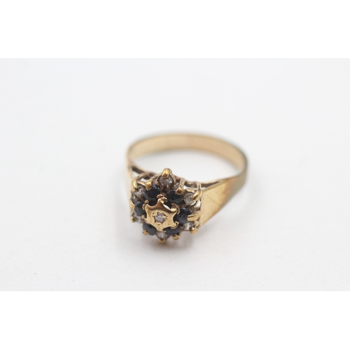 256 - 9ct gold diamond and sapphire ring (2.3g) Size K