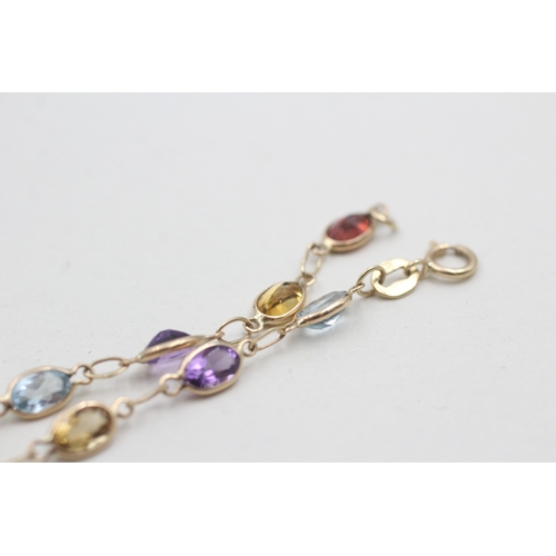 258 - 9ct gold garnet, amethyst, citrine, peridot and topaz bracelet (2.5g)