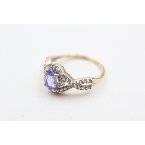 30 - 9ct gold tanzanite & white gemstone dress ring (2g) Size L 1/2