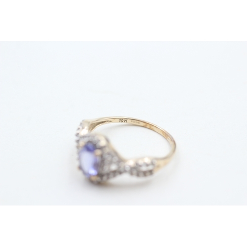 30 - 9ct gold tanzanite & white gemstone dress ring (2g) Size L 1/2