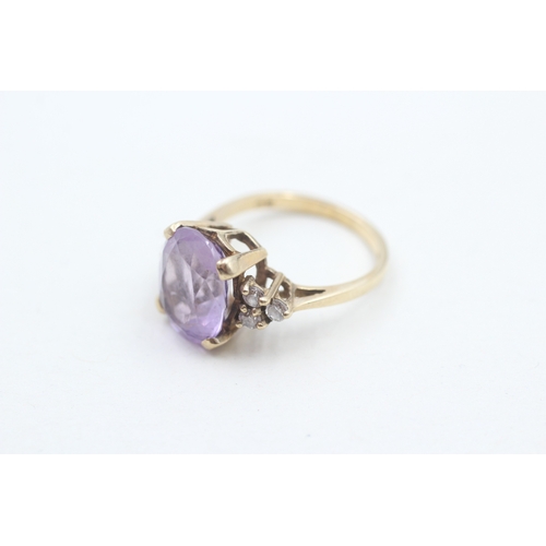 33 - 9ct gold faceted amethyst & cubic zirconia dress ring (3.2g) Size L