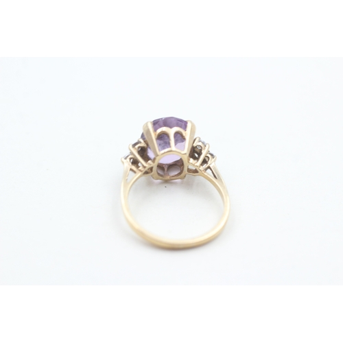 33 - 9ct gold faceted amethyst & cubic zirconia dress ring (3.2g) Size L