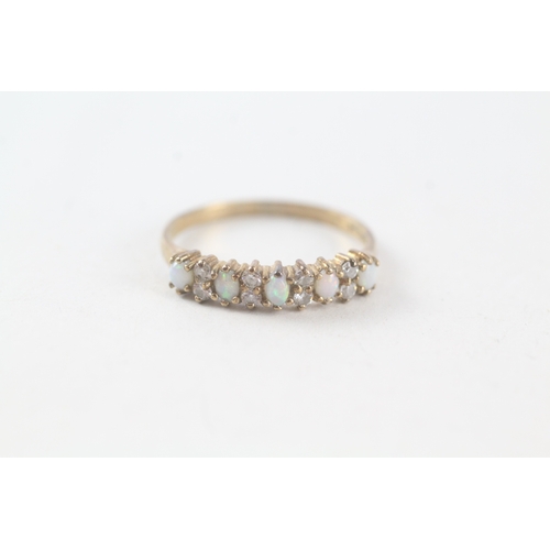 38 - 9ct gold opal and cubic zirconia set half hoop eternity ring (1.4g) Size N 1/2