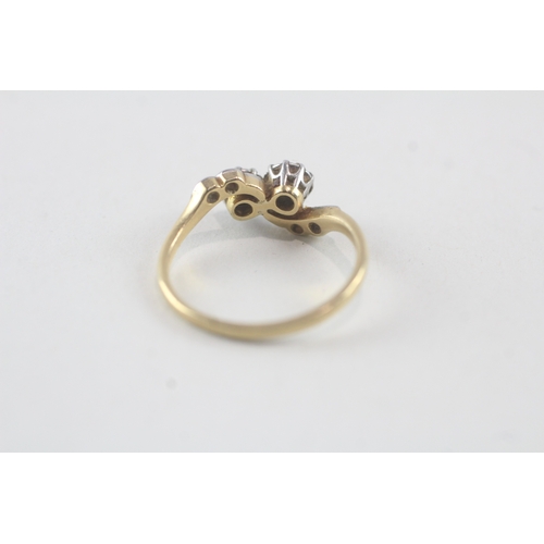 44 - 18ct gold diamond set bypass ring (2.8g) Size N 1/2