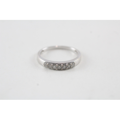 45 - 18ct white gold diamond set seven stone eternity ring (2.4g) Size N 1/2