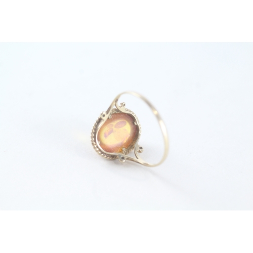 47 - 9ct gold baltic amber cabochon set cocktail ring (2g) Size T