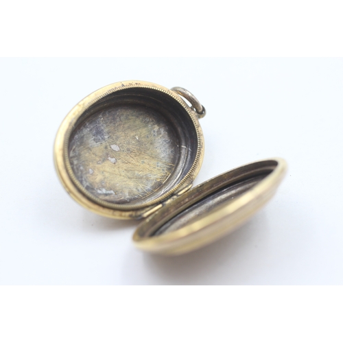 5 - 9ct gold patterned locket (7.7g)