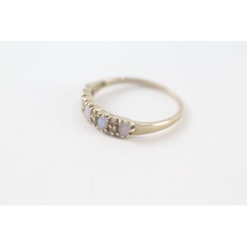 55 - 9ct gold opal and diamond set half hoop eternity ring (1.2g) Size N