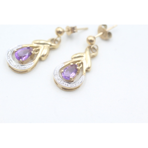 66 - 9ct gold amethyst and diamond drop stud earrings (2.6g)