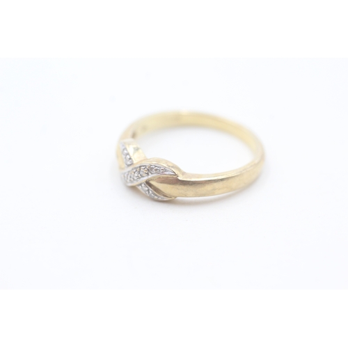 69 - 9ct gold and diamond ring (2.1g) Size N